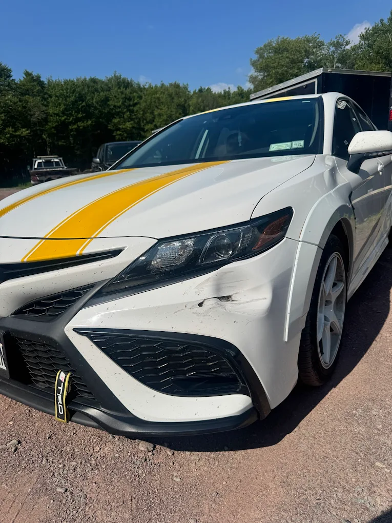 High Level Auto Body shop team at work